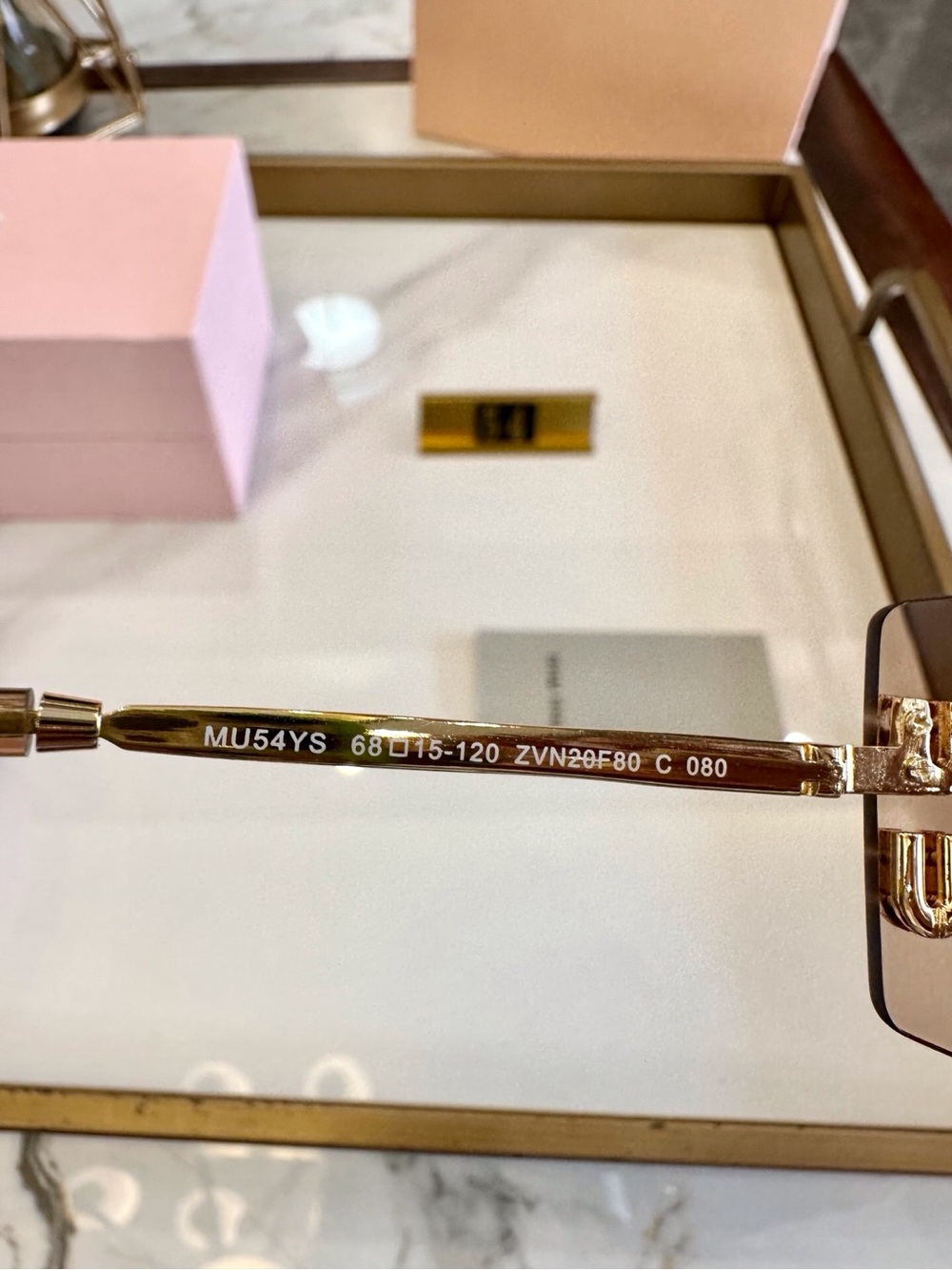 Miu Miu Rimless Sunglasses with Pink-Brown Lenses and Gold Accents - Picture 7 of 8